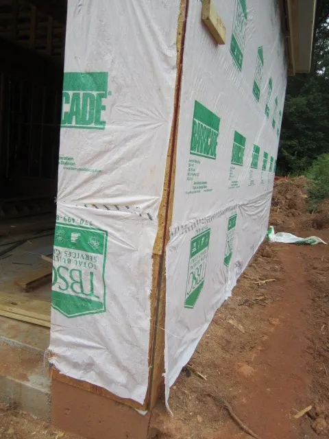 Improperly overlapped housewrap seams — water can wick in