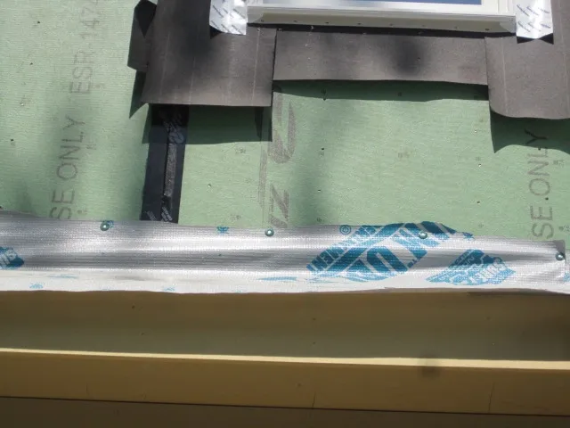 Housewrap bunched and folded instead of laid flat