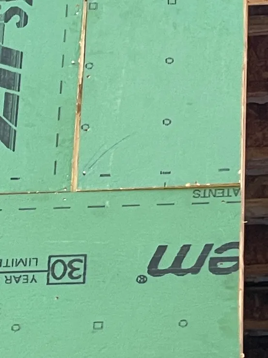 Housewrap installed over wet sheathing — mold risk